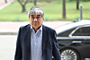 Han Sang-hyuk, chairman of the Korea Communications Commission, heads into his office in Gwacheon, Gyeonngi, on Tuesday. [YONHAP]