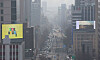 Fine dust blankets downtown Seoul on Sunday as yellow dust arrives in Korea for the first time this year. The yellow dust was brought by northwesterlies from eastern Mongolia, according to the Korea Meteorological Administration. [YONHAP]