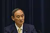Japan's Prime Minister Yoshihide Suga speaks during a press conference at his residence in Tokyo, Thursday. Suga declared a fourth state of emergency would go in effect on Monday and last through Aug. 22. This means the Olympics, opening on July 23 and running through Aug. 8, will be held entirely under emergency measures. [AP]