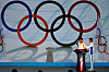Participants transfer the Olympic flame from a cauldron at the ceremony to welcome the flame for the Beijing 2022 Winter Olympics in Beijing on Oct. 20. [REUTERS/YONHAP]