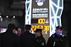 Police officers keep watch near a countdown clock as it crosses into the 100 days countdown to the opening of the Winter Olympics in Beijing, China, Tuesday, Oct. 26, 2021. [AP/YONHAP]