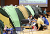 People displaced by recent floods take shelter in a gymnasium of a school in Gurye County, South Jeolla, on Monday. While Korea goes through a protracted rainy season, a typhoon approaches the peninsula. [NEWS1]