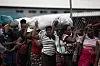 Haitians wait to cross the border to stock up on products, mainly food, at the Binational Market in Dajabon, Dominican Republic, on Sunday. [EPA/YONHAP]