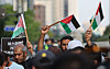 People supporting Palestine protests in front of the Israeli Embassy in Jongno, Seoul, on Thursday. [YONHAP]