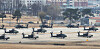 Helicopters are on standby at Camp Humphreys in Pyeongtaek, Gyeonggi, Sunday, ahead of a nine-day military exercise between Seoul and Washington set to kick off Monday. The springtime combined military exercise will be scaled down from previous years and not include field maneuvers amid the Covid-19 pandemic. [YONHAP]
