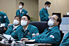 President Yoon Suk-yeol, center, holds a meeting at the crisis management center Tuesday morning after monitoring the government's response to Typhoon Hinnamnor overnight at the presidential office in Yongsan Disrict, central Seoul. [PRESIDENTIAL OFFICE]