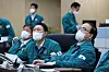President Yoon Suk-yeol, center, holds a meeting at the crisis management center Tuesday morning after monitoring the government's response to Typhoon Hinnamnor overnight at the presidential office in Yongsan Disrict, central Seoul. [PRESIDENTIAL OFFICE]