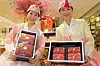 Models for Lotte Department Store pose with Korea beef gift packages. The department store said it will take orders for this year's Lunar New Year gift packages through Jan. 7. [LOTTE DEPARTMENT STORE]