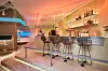 A cafe and bar area at a communal lounge in Episode Seongsu 101, a co-living space in Seongdong District, eastern Seoul. [SK D&D]