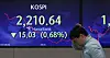 Electronic display boards at Hana Bank in central Seoul show stock and foreign exchange markets on Tuesday morning. [YONHAP]