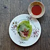 Yukhoe, Korean style beef tartar is seasoned with sesame oil and gochugaru, hot pepper flakes. Just like Koreans often pair pear with the dish, the restaurant also serves the raw meat with pear and some sesame leaves. [AGENCE NEROLI]