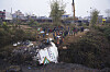A rescue team works to recover the body of a victim from the site of the crash of a Yeti Airlines plane in Pokhara, Nepal on Monday. [AP/YONHAP]