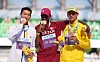 Silver medalist Woo Sang-hyeok of Korea, left, poses with gold medalist Mutaz Essa Barshim of Qatar and bronze medalist Andriy Protsenko of Ukraine during the medal ceremony for the men's high jump at the 2022 World Athletics Championships in Eugene, Oregon on Monday. Woo is the first Korean athlete ever to win a silver medal in any event at the World Championships. [XINHUA/YONHAP]