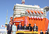 Korean President Moon Jae-in, center left, and Mozambique President Filipe Jacinto Nyusi, center right, take part in a christening ceremony for the Coral-Sul floating liquefied natural gas (FLNG) facility at the Samsung Heavy Industries shipyard in Geoje, South Gyeongsang, on Monday. [YONHAP]