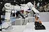 A robotic arm manipulates an egg at Intermold Korea 2025 at Kintex in Goyang, Gyeonggi, on March 11. [YONHAP]