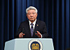 Kim Hong-il, chair of the Anti-Corruption and Civil Rights Commission, speaks to reporters at the Yongsan presidential office in central Seoul on Wednesday after his nomination by President Yoon Suk Yeol as the new head of the Korea Communications Commission. [JOINT PRESS CORPS]