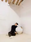 RM, the leader of the boy band BTS, poses with a moon jar made by Kwon Dae-sup and purchased by the K-pop star, in a photo uploaded on the band’s official Twitter account on Nov. 17, 2019. [BTS TWITTER]