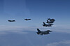 Fighter jets from the South Korean and U.S. militaries fly in formation during a joint air exercise over the Yellow Sea in a show of force on Tuesday. [JOINT CHIEFS OF STAFF]