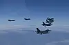 Fighter jets from the South Korean and U.S. militaries fly in formation during a joint air exercise over the Yellow Sea in a show of force on Tuesday. [JOINT CHIEFS OF STAFF]