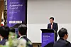 The American Chamber of Commerce in Korea (Amcham) Chairman James Kim gives a speech at Amcham Automotive Summit on Tuesday in central Seoul. [AMCHAM]