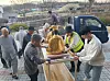 Monks and staffers transport golden Buddha statues to a safer area after a wooden temple was burned by a wildfire in Uiseong County in North Gyeongsang on March 22. [GOUN TEMPLE]