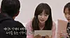 A scene from ″Transit Love″ shows a cast member reading advice from her love interest's ex. [SCREEN CAPTURE]