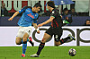 Napoli defender Kim Min-jae in action against AC Milan's Sandro Tonali during a UEFA Champions League quarterfinal match at San Siro in Milan, Italy on Wednesday. [EPA/YONHAP]