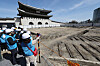 Japanese colonial-era tram tracks discovered near Gwanghwamun Gate in central Seoul are shown to the public on Thursday. [YONHAP]