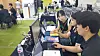 Teachers try out prototypes for AI-based digital textbooks at a conference at Daegu Exhibition & Convention Center on Wednesday. [YONHAP]