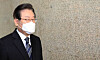 Democratic Party Chairman Lee Jae-myung makes a brief appearance at the National Assembly on March 2. [YONHAP]