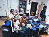 The Lulendo family holds boxes of letters and snacks offered by elementary school students from a nearby church on Monday at their home in Ansan, Gyeonggi. The father, Nkuka Lulendo, is in Congo receiving traditional healing practices from his mother for physical pain. [HONG JOO-MIN]
