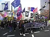 College feminists fighting for gender equality storm the streets on March 8, 2019, Women’s Day, in Jongno District, Seoul, holding various signs, demanding awareness about women's inequalities. [YONHAP]