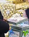 A shopper looks at chocolate on display at a store in Seoul on Feb. 13, the day before Valentine's Day. [YONHAP]