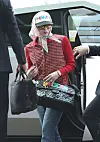 G-Dragon arrives at Incheon International Airport in Tesla Cybertruck