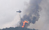 A helicopter on Monday continues to extinguish a fire that broke out in Hongseong County, South Chungcheong, on Sunday. [YONHAP]