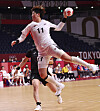 Right back Ryu Eun-hee jumps up to shoot in Korea's preliminary round group A match against Japan. [YONHAP]