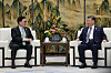 Korean National Assembly Speaker Woo Won-shik, left, speaks with Chinese President Xi Jinping in a meeting held on the sidelines of the Asian Winter Games opening ceremony at the Taiyangdao Hotel in Harbin, China, on Feb. 7. [YONHAP]