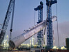 A distillation tower is installed at the Shaheen petrochemical project site in Ulsan on March 27. [HYUNDAI CONSTRUCTION & ENGINEERING]