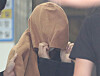 A Korean woman in her 40s, who is a suspect in the case of two children's bodies found inside suitcases in New Zealand in August, walks out of Ulsan Metropolitan Police Agency on Sept. 15, 2022.[YONHAP]