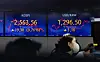 Screens in Hana Bank's trading room in central Seoul show stock and foreign exchange markets close on Friday. [NEWS1]