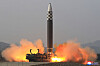 A Hwasong-17 intercontinental ballistic missile (ICBM) is launched from Pyongyang International Airport on Thursday, in a photo released by North Korea's official Korean Central News Agency (KCNA) on March 18. [YONHAP]