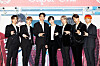Boy band SuperM poses for photos prior to the online press conference held on Friday morning ahead of the release of its first full-length album 'Super One.' [SM ENTERTAINMENT]