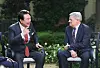 President Yoon Suk Yeol, left, chats with Netflix co-CEO Ted Sarandos in a meeting at Blair House in Washington on Monday. [JOINT PRESS CORPS]