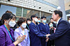 President Yoon Suk Yeol, right, shakes hands with medical professionals at Hankook General Hospital in North Chungcheong on Tuesday. [PRESIDENTIAL OFFICE]