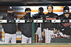 The KT Wiz players and coaching staff react to the news that the LG Twins lost 3-2 to the SK Wyverns on the sidelines of their game against the Hanwha Eagles at Hanwha Life Eagles Park in Daejeon. With the Twins' loss, the Wiz automatically finished second in the 2020 KBO regular season. [YONHAP]