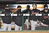 The KT Wiz players and coaching staff react to the news that the LG Twins lost 3-2 to the SK Wyverns on the sidelines of their game against the Hanwha Eagles at Hanwha Life Eagles Park in Daejeon. With the Twins' loss, the Wiz automatically finished second in the 2020 KBO regular season. [YONHAP]
