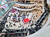 Customers walk around a shopping mall in Seoul on Christmas Day, 2023. [YONHAP]