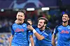 Napoli midfielder Piotr Zielinski, left, celebrates after scoring a penalty during a UEFA Champions League Group A match against Liverpool at Stadio Diego Armando Maradona in Naples on Wednesday. [AFP/YONHAP]