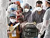 Hundreds of Afghans who helped at the Korean embassy, hospital and other missions in Kabul arrive at the Incheon International Airport on Aug. 26. The Korean government plans to allow them to stay here long-term and engage in job activity. [JOINT PRESS CORPS]