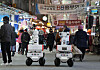 Fire detection patrol robots stand on the street inside Namguro Market in Guro District, western Seoul, on Thursday afternoon. Seoul Metropolitan Government is the first local government to operate on a trial basis patrol robots that can detect and extinguish fires and help people evacuate, keeping the market safe at night. [YONHAP]